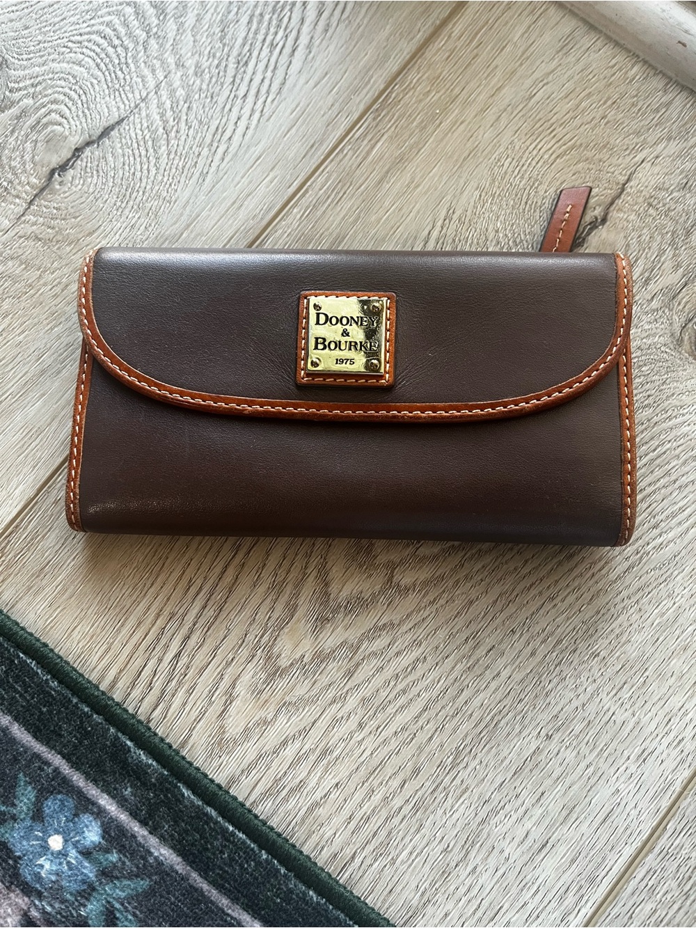 Dooney & Bourke Dark Brown Leather Wallet with Tan Trim and Gold Plaque
